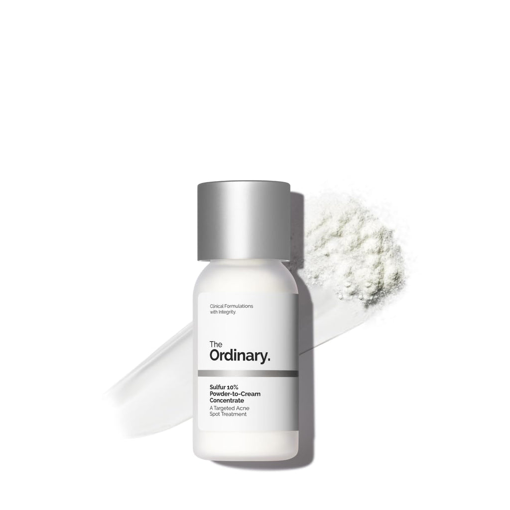 SlimBag The Ordinary Sulfur 10% powder-to-cream acne spot treatment showing a small jar of the product with a spoon for application, close-up.