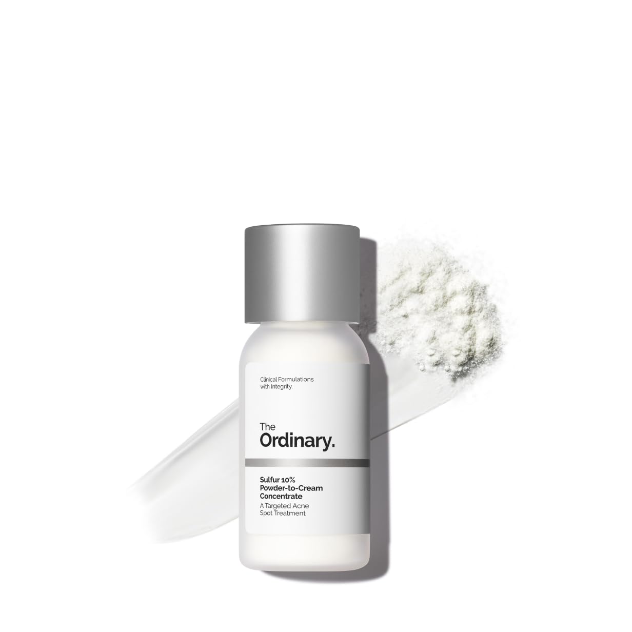 SlimBag The Ordinary Sulfur 10% powder-to-cream acne spot treatment showing a small jar of the product with a spoon for application, close-up.