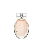 Calvin Klein Sheer Beauty floral eau de toilette with peach bellini, pink lily, peony, and vanilla blossom notes in a sleek bottle