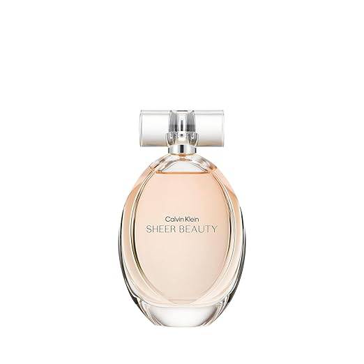 Calvin Klein Sheer Beauty floral eau de toilette with peach bellini, pink lily, peony, and vanilla blossom notes in a sleek bottle