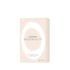 Calvin Klein Sheer Beauty floral perfume bottle with peach bellini, pink lily, peony, and vanilla blossom notes.