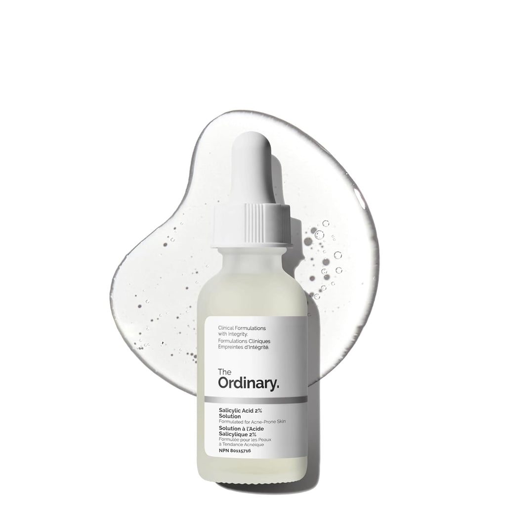 SlimBag salicylic acid 2% solution bottle for acne treatment, featuring clear liquid and minimalist label design.