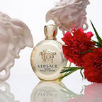 Versace Eros Pour Femme Eau de Parfum spray in 3.4 oz bottle, sleek packaging with elegant design and floral accents