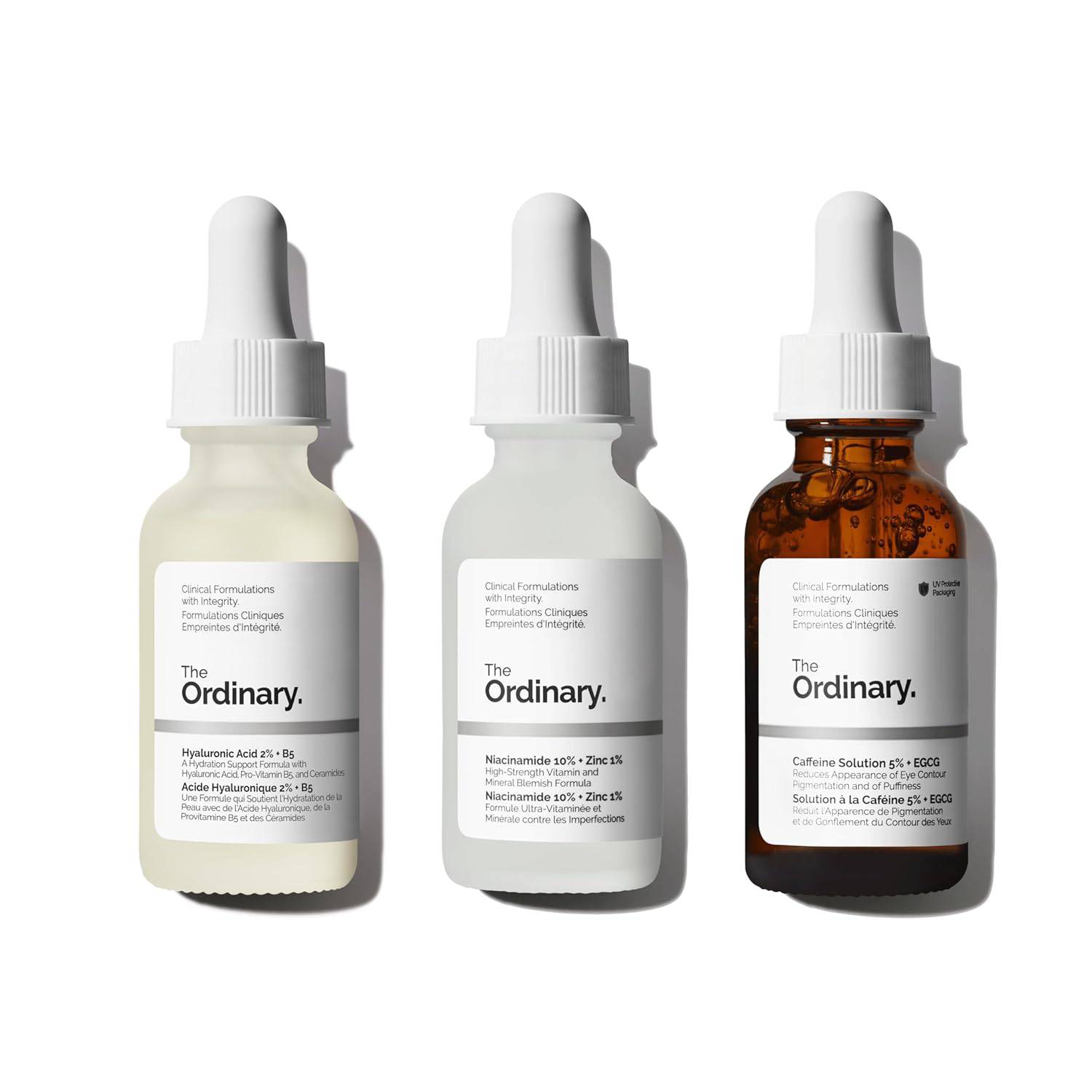 Set of The Ordinary skincare serums including Hyaluronic Acid, Niacinamide, and Caffeine Solution for hydrating and brightening skin.