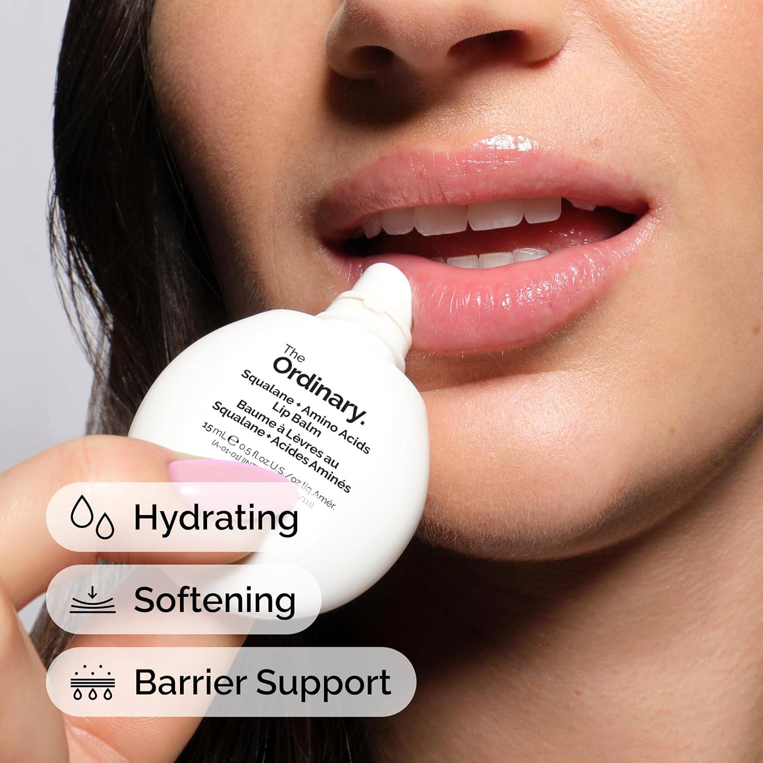 The Ordinary Squalane + Amino Acids hydrating lip balm in a small tube, suitable for lips, elbows, and cuticles.