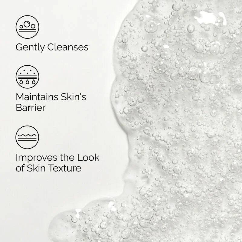 SlimBag Glucoside Foaming Cleanser in a pump bottle, showing the clear foaming formula ready for skincare use.