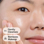SlimBag Squalane Cleanser being applied to the face, showcasing its gentle, hydrating formula for smooth, refreshed skin.